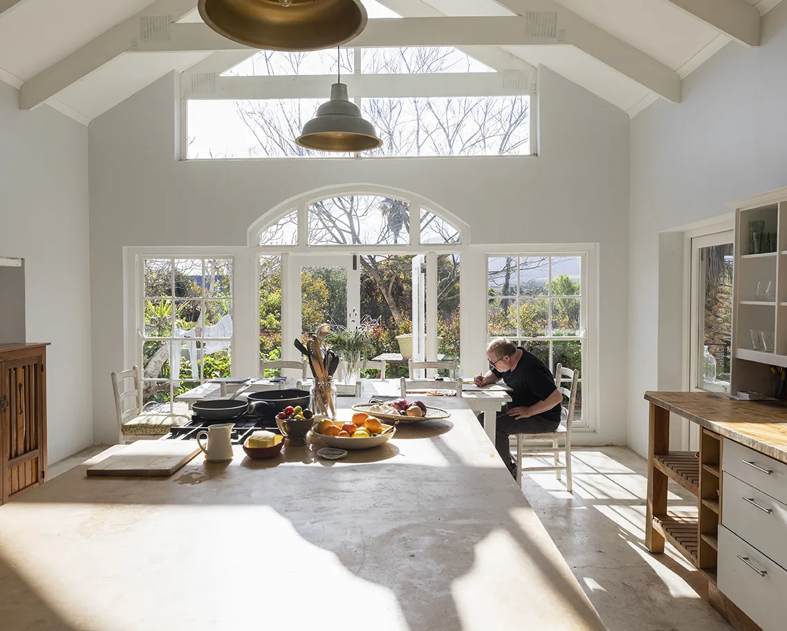 man working from home with vacuum glass installed